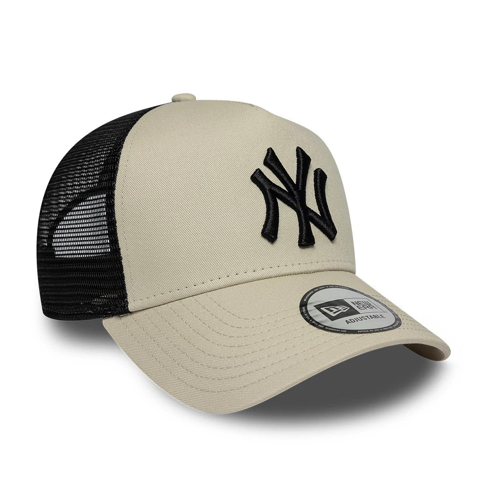 Yankees MLB League Essential Beige New Era 9FORTY A-Frame Trucker Adjustable Cap, front view showing a black raised embroidered NY Yankees logo on the beige structured front panels, a black mesh rear with curved visor and 9FORTY size sticker.
