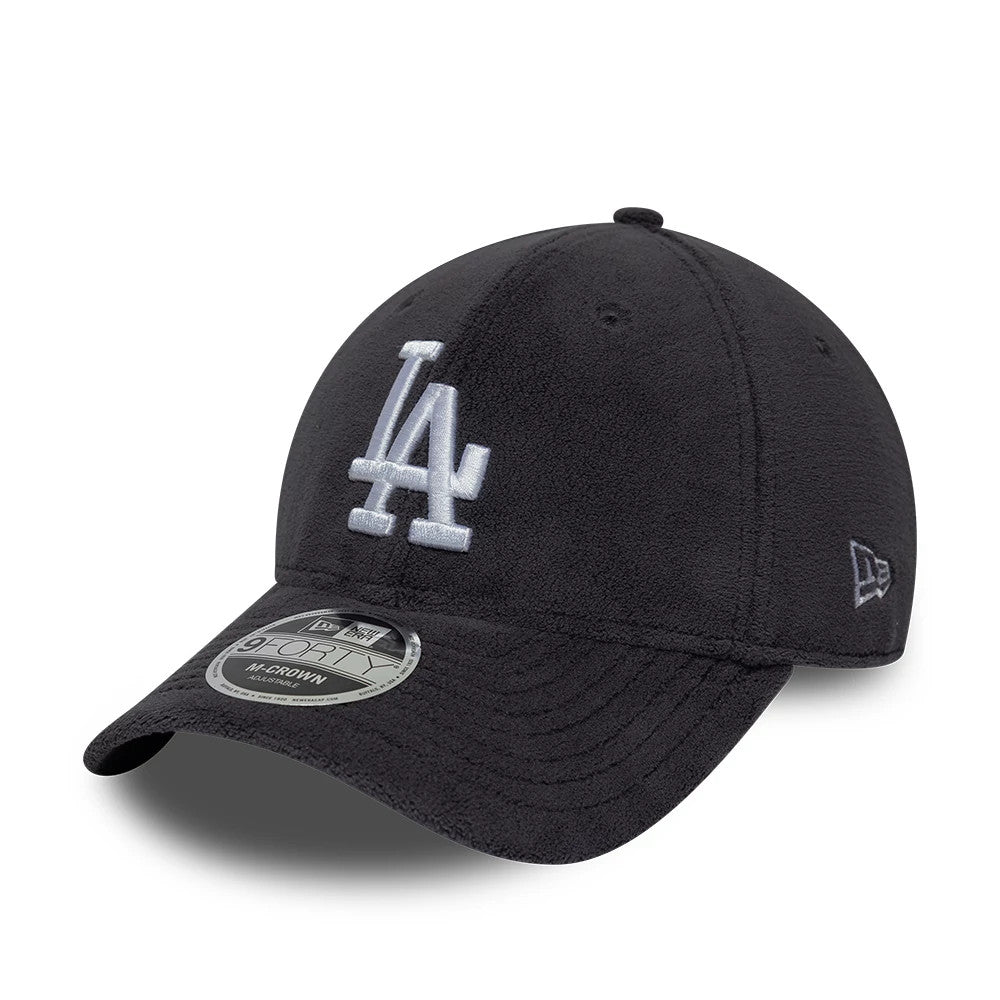 LA Dodgers MLB Fleece Charcoal New Era 9FORTY M-Crown Adjustable Cap, three-quarter view showing a white raised embroidered LA logo on the front panel, a curved fleece visor with a 9FORTY size sticker, and grey New Era flag logo on the left side.