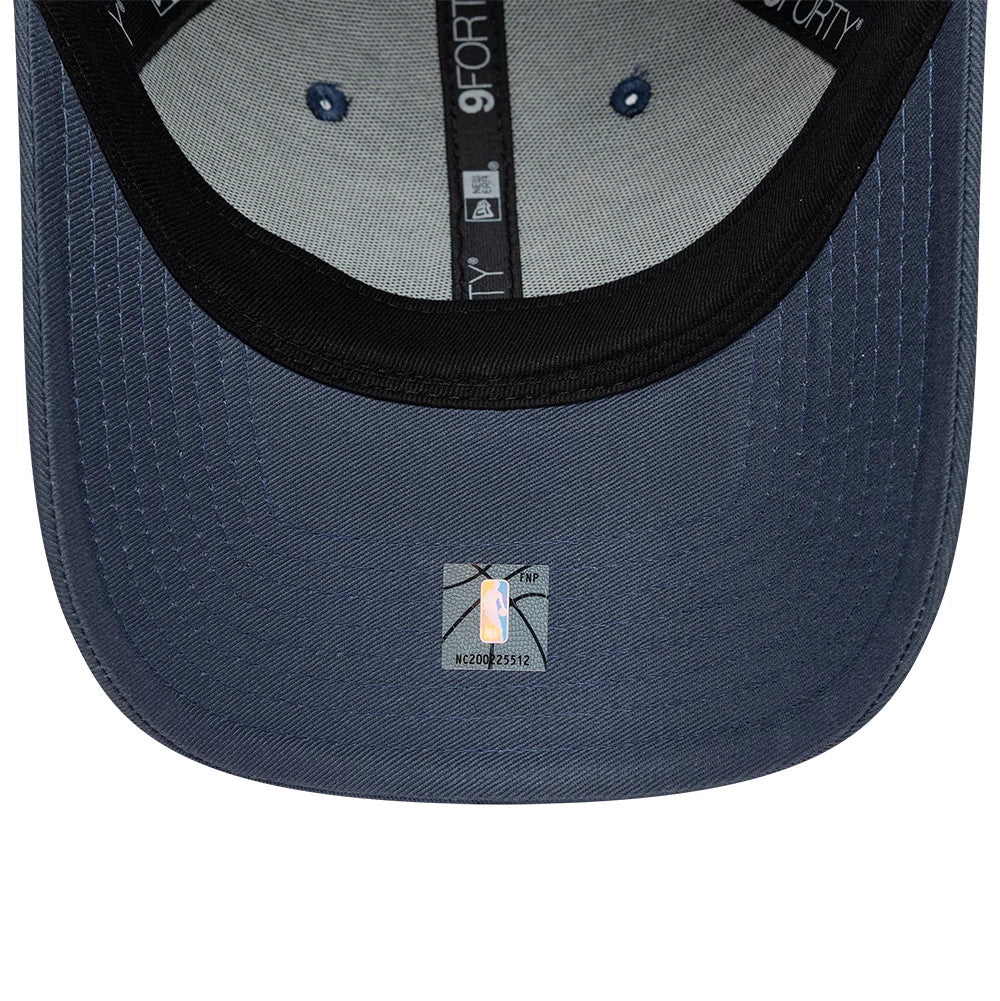 LA Lakers NBA Team Outline Dark Blue New Era 9FORTY Adjustable Cap, inside view showing grey taping with 9FORTY branding, a black sweatband lining the crown, and a grey undervisor featuring an NBA holographic sticker at the centre.