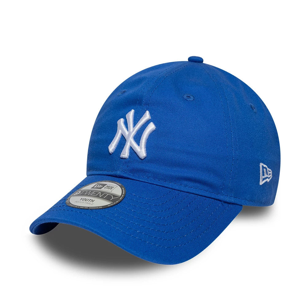New York Yankees Youth MLB League Essential Blue New Era 9TWENTY Adjustable Cap, three-quarter view showing the raised white embroidered NY logo on the front panel, with an unstructured blue crown and a grey 9TWENTY size sticker on the curved visor.