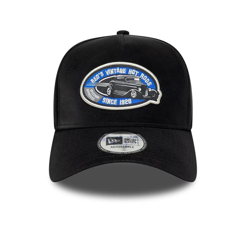 New Era Moto Patch PU Black New Era 9FORTY E-Frame Adjustable Cap, front view showing the embroidered oval moto patch with a vintage car graphic on the structured black crown, and a 9FORTY size sticker on the curved black visor.