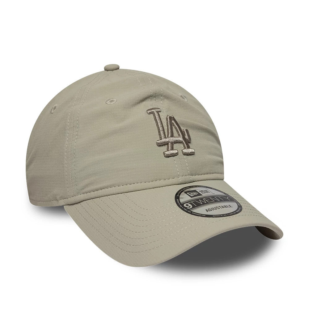 LA Dodgers MLB Ripstop Beige New Era 9TWENTY Adjustable Cap, front view showing a raised embroidered LA logo on the front panel, with a curved beige visor and a 9TWENTY size sticker on top.