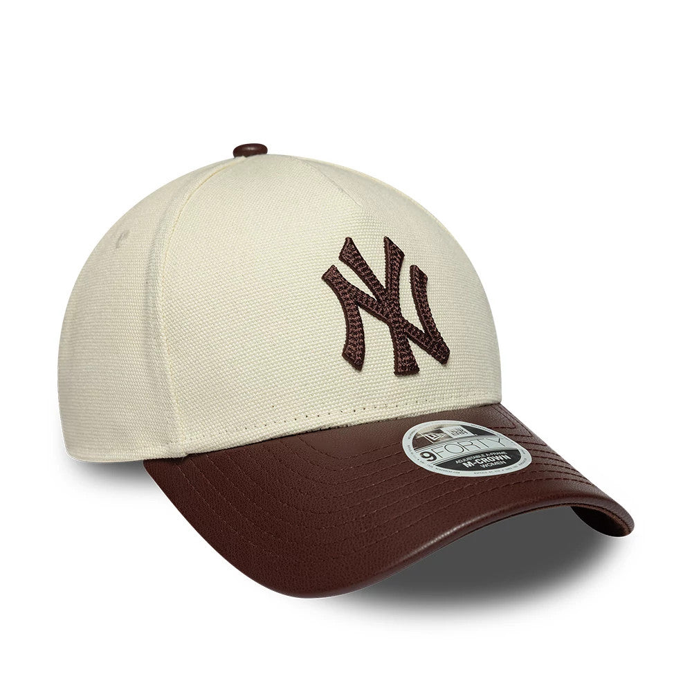 Yankees Womens MLB Fabric Mix Beige New Era 9FORTY M-Crown A-Frame Adjustable Cap, three-quarter view showing the raised brown embroidered NY logo on the beige textured crown, brown curved visor and a 9FORTY size sticker on the visor.