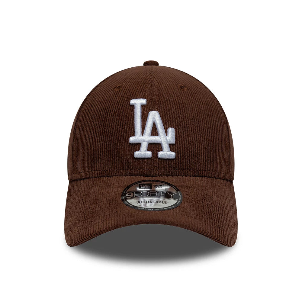 LA Dodgers MLB Cord Brown New Era 9FORTY Adjustable Cap, front view showing the white raised embroidered LA logo on the structured brown corduroy crown, with a curved visor and 9FORTY size sticker on the centre of the visor.
