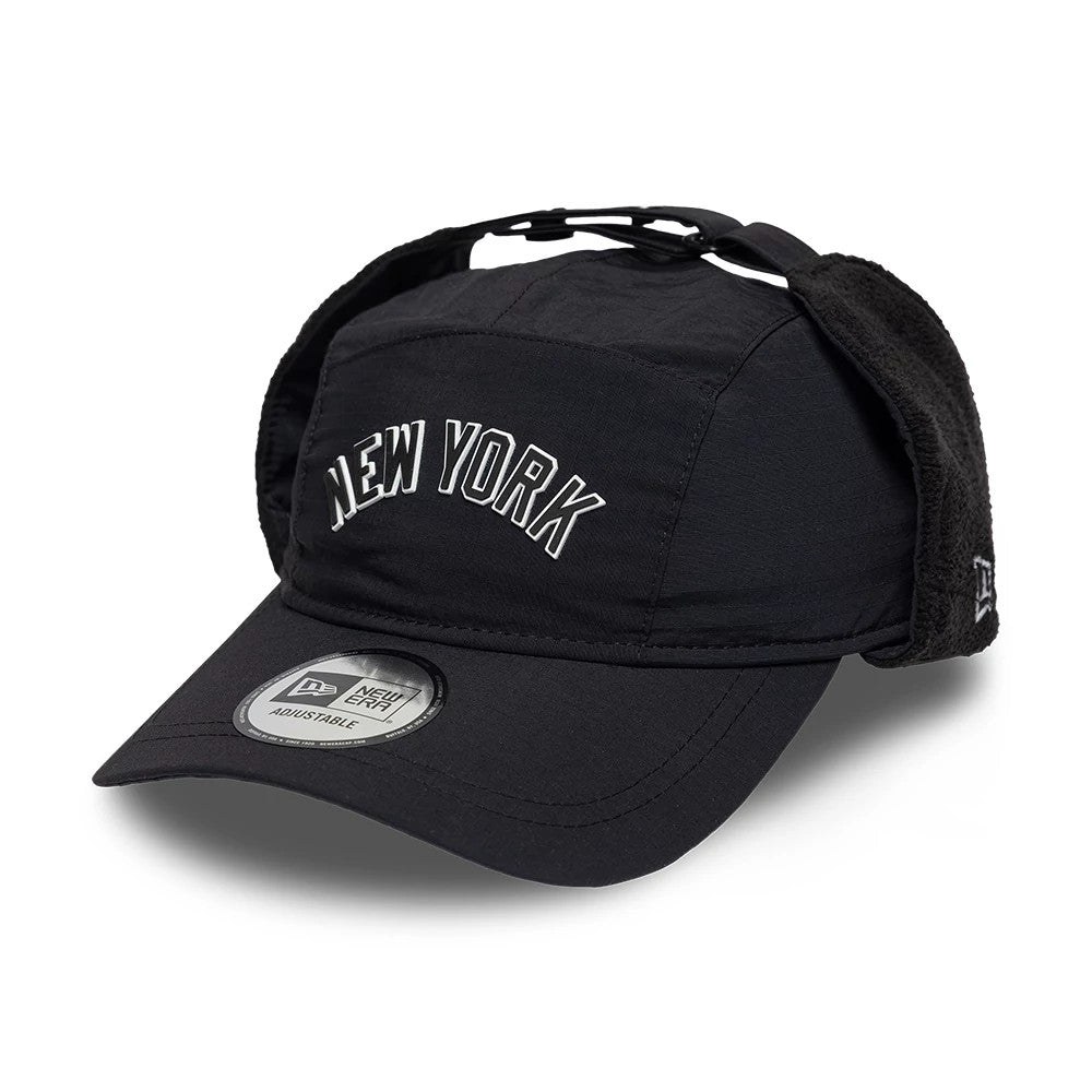 New Era New York Yankees MLB Fleece Black Dogear Camper Adjustable Cap, front view showing the white embroidered New York lettering on the front panel, adjustable strap at the top, black fleece-lined dogears, and New Era logo on the side.