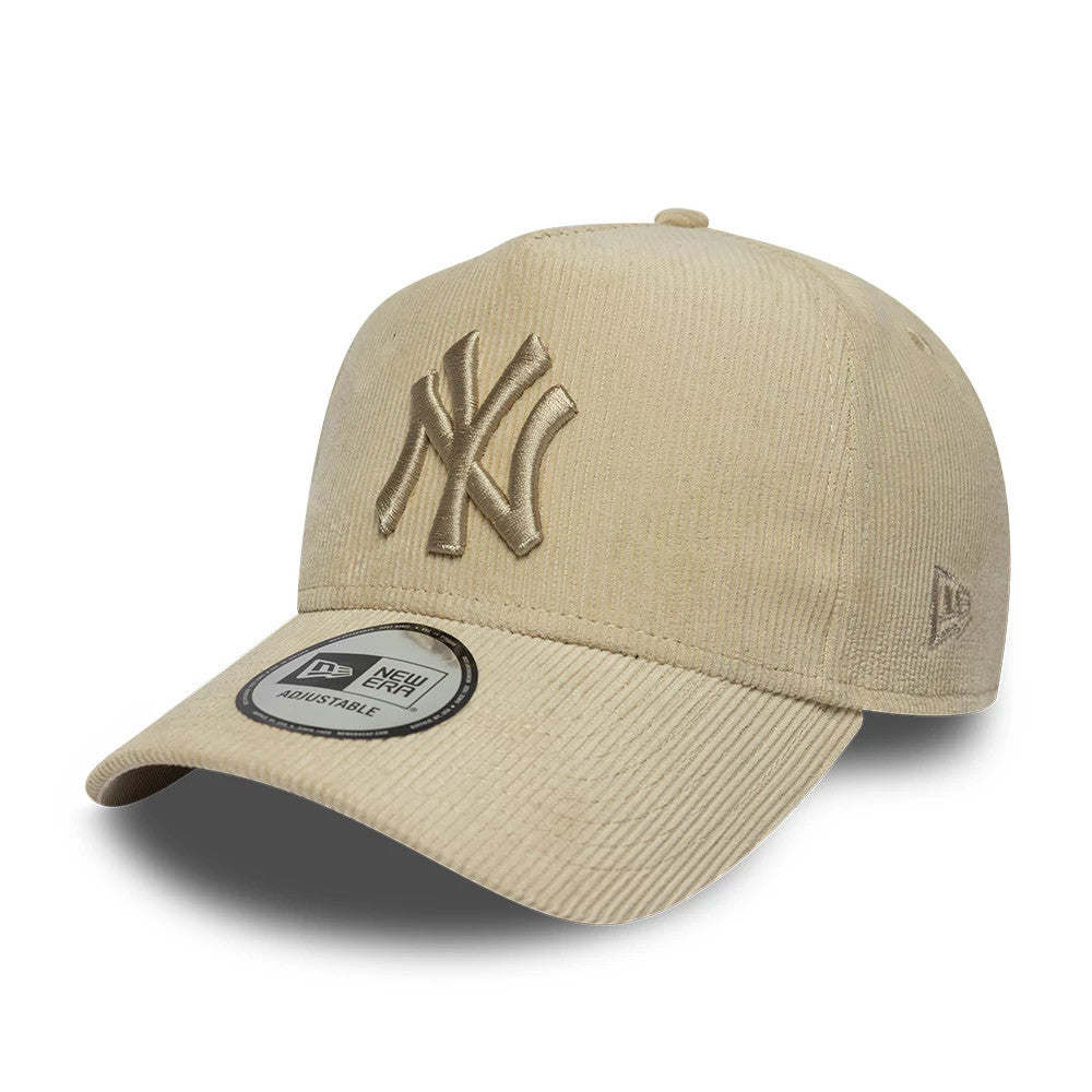 New York Yankees MLB Cord Light Beige New Era 9FORTY E-Frame Adjustable Cap, three-quarter view showing the raised embroidered NY logo on the front panel, the New Era flag logo on the left side, and a 9FORTY size sticker on the curved visor.