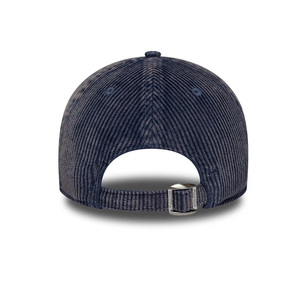 New Era Patch Acid Cord Dark Blue New Era 9TWENTY Adjustable Cap, rear view showing the strap with a buckle, ridged corduroy texture across the dark blue panels, and circular embroidered eyelets on each side of the structured crown.
