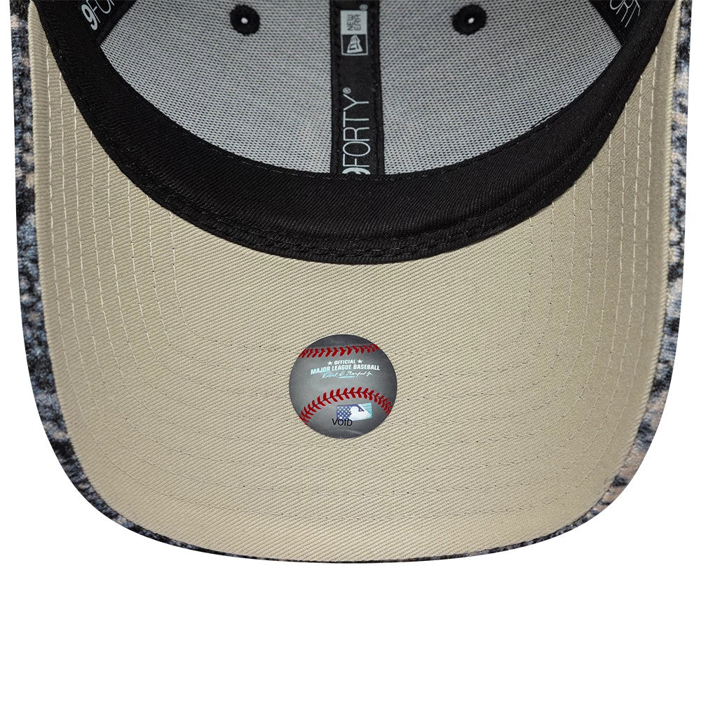 New York Yankees Womens MLB Snake Print Black New Era 9FORTY Adjustable Cap, inside view showing the grey taping with white lettering, a black sweatband, and a beige undervisor featuring an MLB baseball sticker.