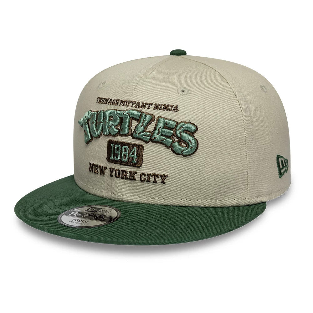 Pictured is this Youth Teenage Mutant Ninja Turtles 9FIFTY Snapback cap in light beige & green. 1
