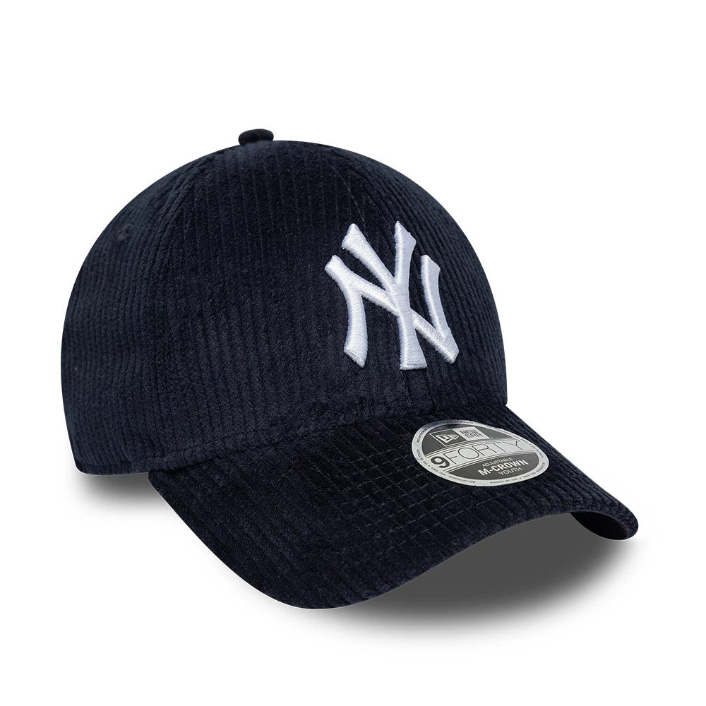 New York Yankees Youth MLB Cord Navy New Era 9FORTY M-Crown Adjustable Cap, front view showing a white raised embroidered Yankees logo on the front panel, a curved corduroy visor with a 9FORTY size sticker, and a navy corduroy crown.