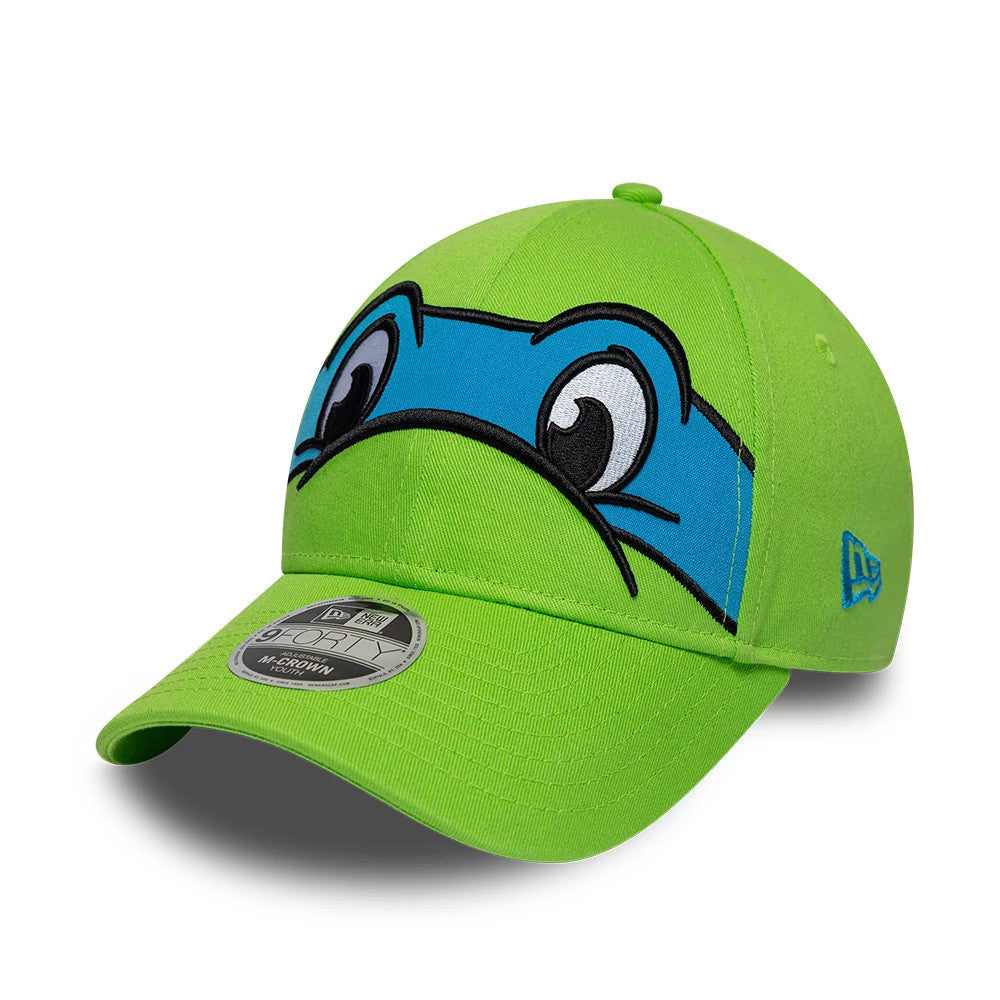 Youth TMNT Face Bright Green New Era 9FORTY M-Crown Adjustable Cap, front view showing the large embroidered turtle eyes and blue mask graphic on the structured crown, with the New Era flag logo on the left side.