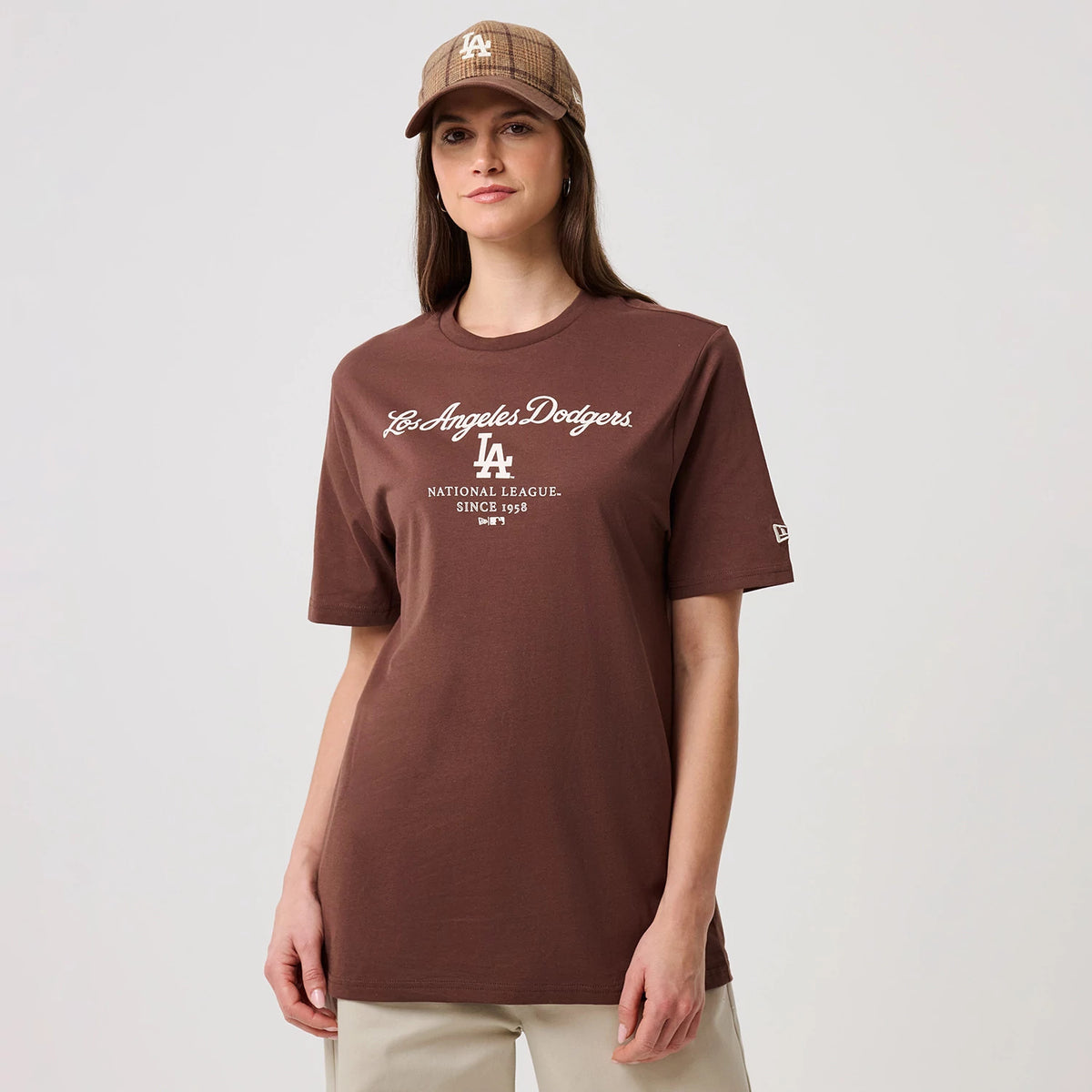 The model is wearing this MLB Linear LA Dodgers T-Shirt in brown. 4