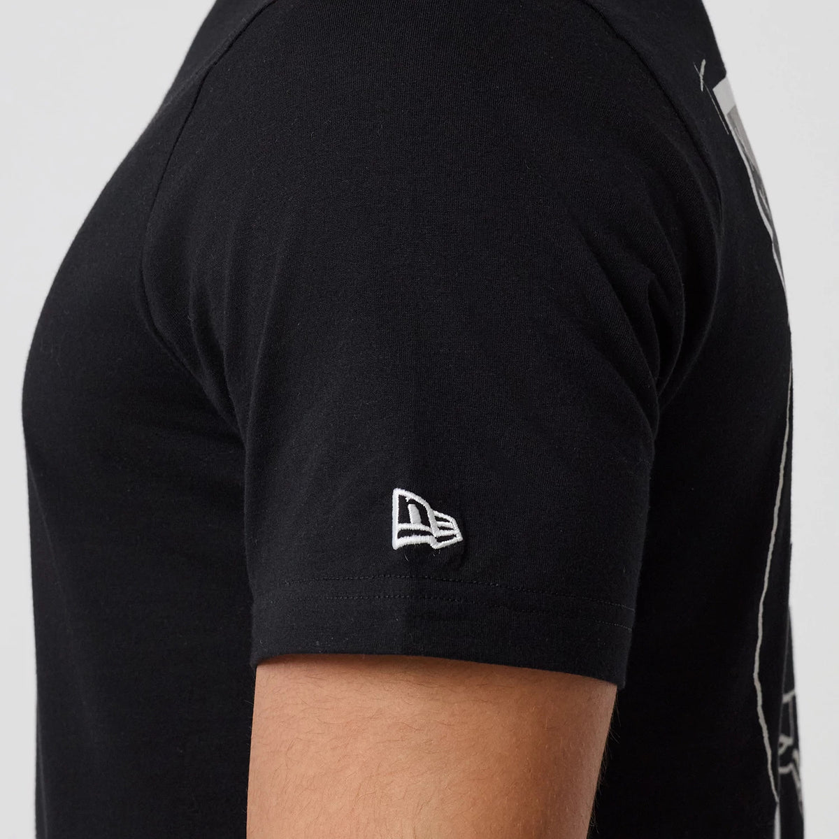 The model is wearing this NBA Graphic Chicago Bulls T-Shirt in black. 8