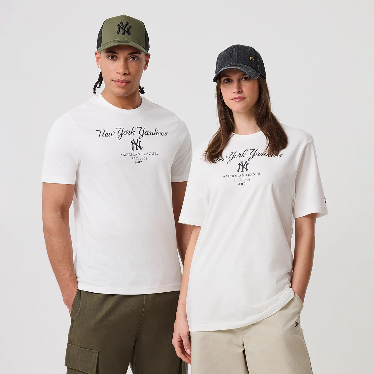 The model is wearing this MLB Linear New York Yankees T-Shirt in white. 1