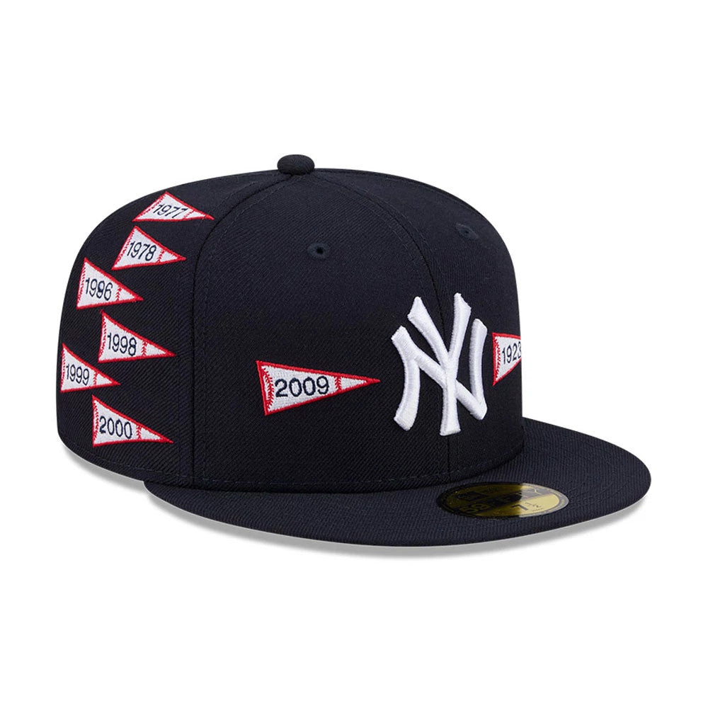 New York Yankees MLB X Spike Lee Flags Navy New Era 59FIFTY Fitted Cap, front and side view showing the white raised NY logo on the front panel, red pennant graphics with years embroidered on the side.