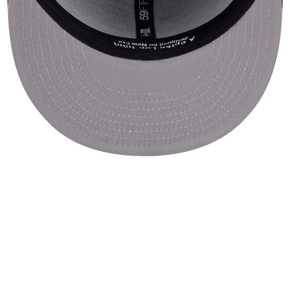 Yankees MLB X Spike Lee Crossed Bats Navy New Era 59FIFTY Fitted Cap, inside view showing a grey undervisor with neat stitching, black sweatband with size and style labels, and a black tape with an embroidered New Era logo and 59FIFTY branding.