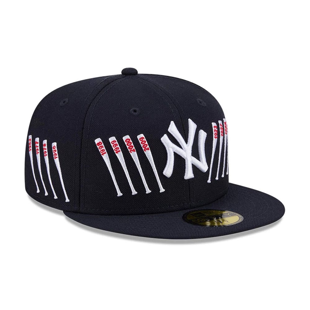 Yankees MLB X Spike Lee Baseball Bats Navy New Era 59FIFTY Fitted Cap, three-quarter view showing the raised white NY logo on the navy front panel, embroidered white baseball bats with red years on the sides.