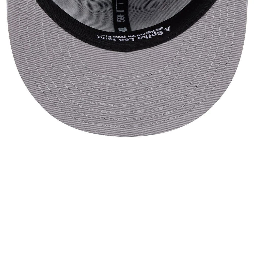 Pictured is this MLB X Spike Lee Baseball Bats New York Yankees 59FIFTY Fitted cap in navy. 2