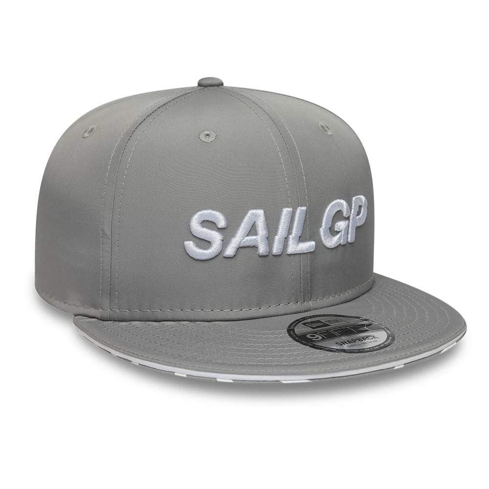 Sail GP Limited Grey New Era 9FIFTY Snapback Adjustable Cap, front view showing the raised white embroidered Sail GP logo on the front panels, a flat grey visor with a 9FIFTY size sticker, and matching grey eyelets and top button.