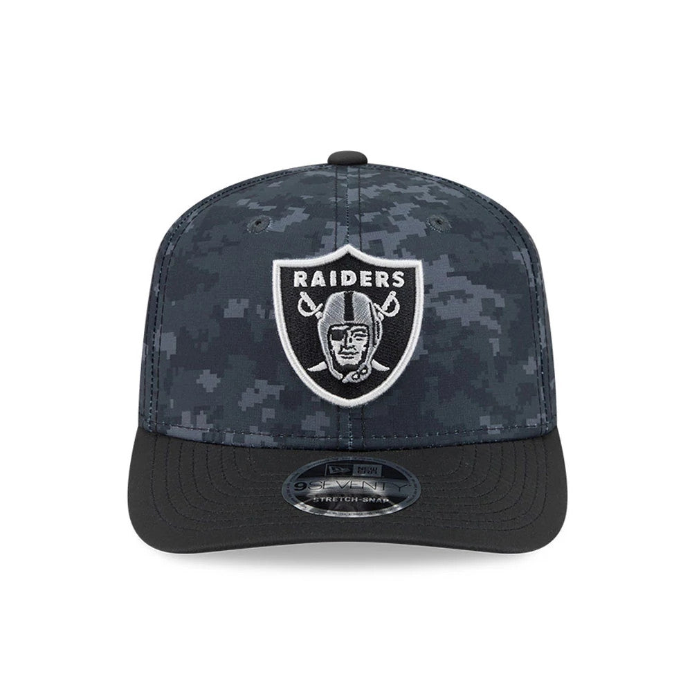 Raiders NFL Digi Camo & Black New Era 9SEVENTY Stretch Snap Adjustable Cap, front view showing the raised embroidered Raiders shield logo on the digi camo front panels, black curved visor with 9SEVENTY size sticker, and matching top button.
