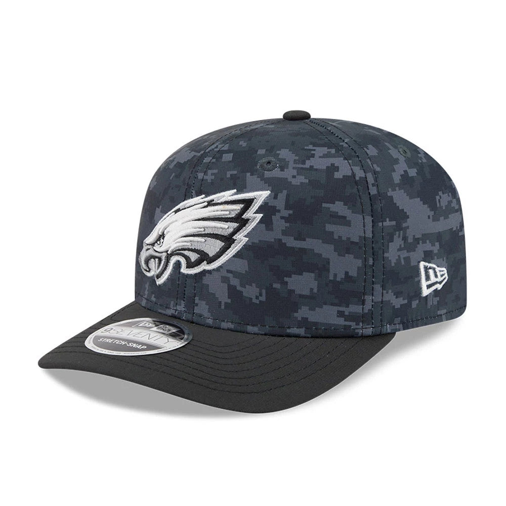 Eagles NFL Digi Camo & Black New Era 9SEVENTY Stretch Snap Adjustable Cap, three-quarter view showcasing the raised embroidered Eagles logo on the front panel, digi camo pattern on the structured crown, and black visor with a 9SEVENTY size sticker.