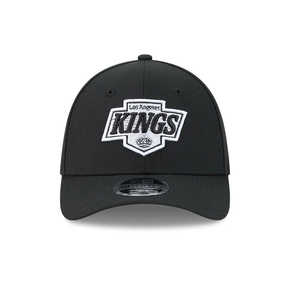 LA Kings NHL Black New Era 39THIRTY M-Crown Stretch Fit Cap, front view showing the white and black embroidered LA Kings logo on the front panel, with a curved black visor and a 39THIRTY size sticker.