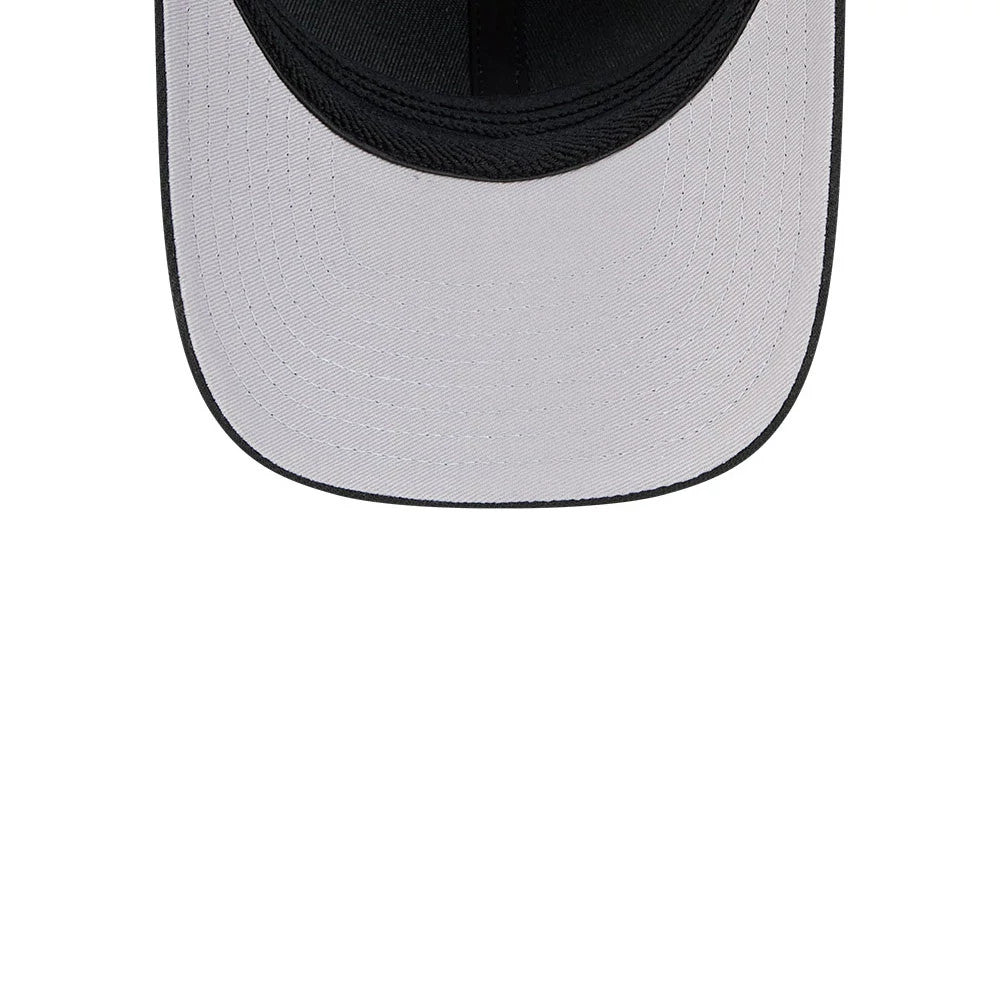 LA Kings NHL Black New Era 39THIRTY M-Crown Stretch Fit Cap, inside view showing a white undervisor with neat stitching, complemented by a black sweatband and interior taping along the seams inside the structured crown.