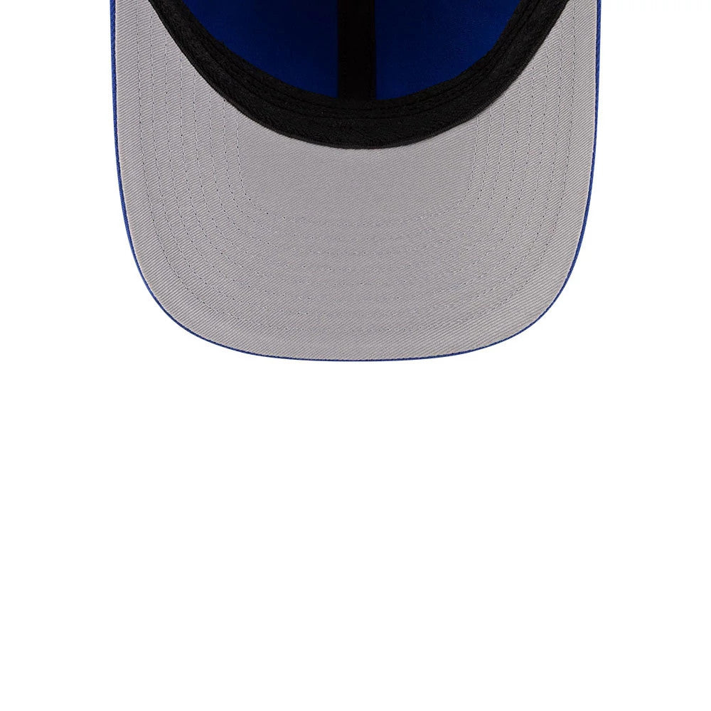 New York Knicks NBA Team Blue New Era 39THIRTY M-Crown Stretch Fit Cap, inside view showing the grey undervisor, black sweatband outlining the interior, and blue taping running along the seams of the structured crown.