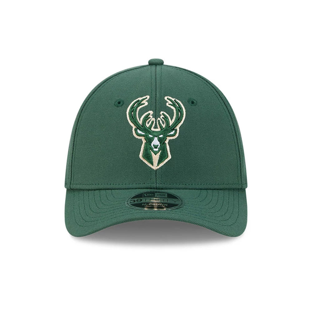 Milwaukee Bucks NBA Team Dark Green New Era 39THIRTY M-Crown Stretch Fit Cap, front view showing the embroidered Bucks logo in green and white on the structured crown, with a curved visor and a 39THIRTY size sticker.