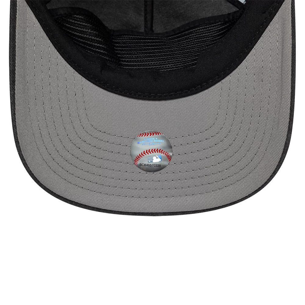 New York Mets MLB Black New Era 19TWENTY Adjustable Cap, inside view showing a grey undervisor with detailed stitching and a central baseball graphic sticker, accompanied by a black sweatband and inner taping on the structured interior.