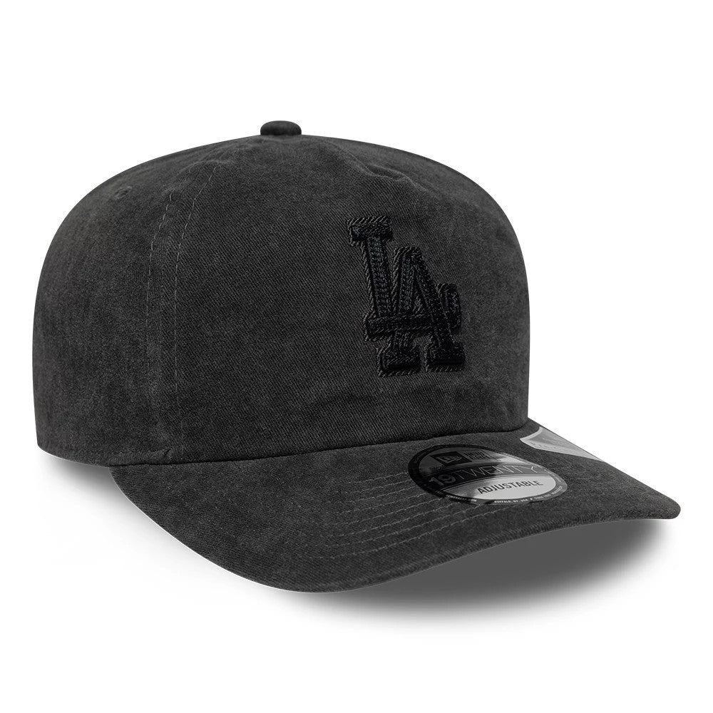 LA Dodgers MLB Black New Era 19TWENTY Adjustable Cap, three-quarter view showing the black embroidered LA logo on the front panel, a curved black visor with a 19TWENTY size sticker, and the top button in matching black fabric.