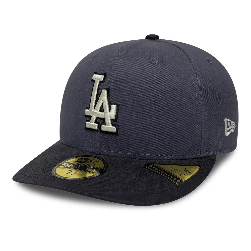 LA Dodgers MLB Dark Grey New Era 59FIFTY Fitted Cap, three-quarter view showing a raised white embroidered LA logo on the front panel, complemented by a gold 59FIFTY size sticker on the flat dark grey visor and New Era flag logo on the left side.