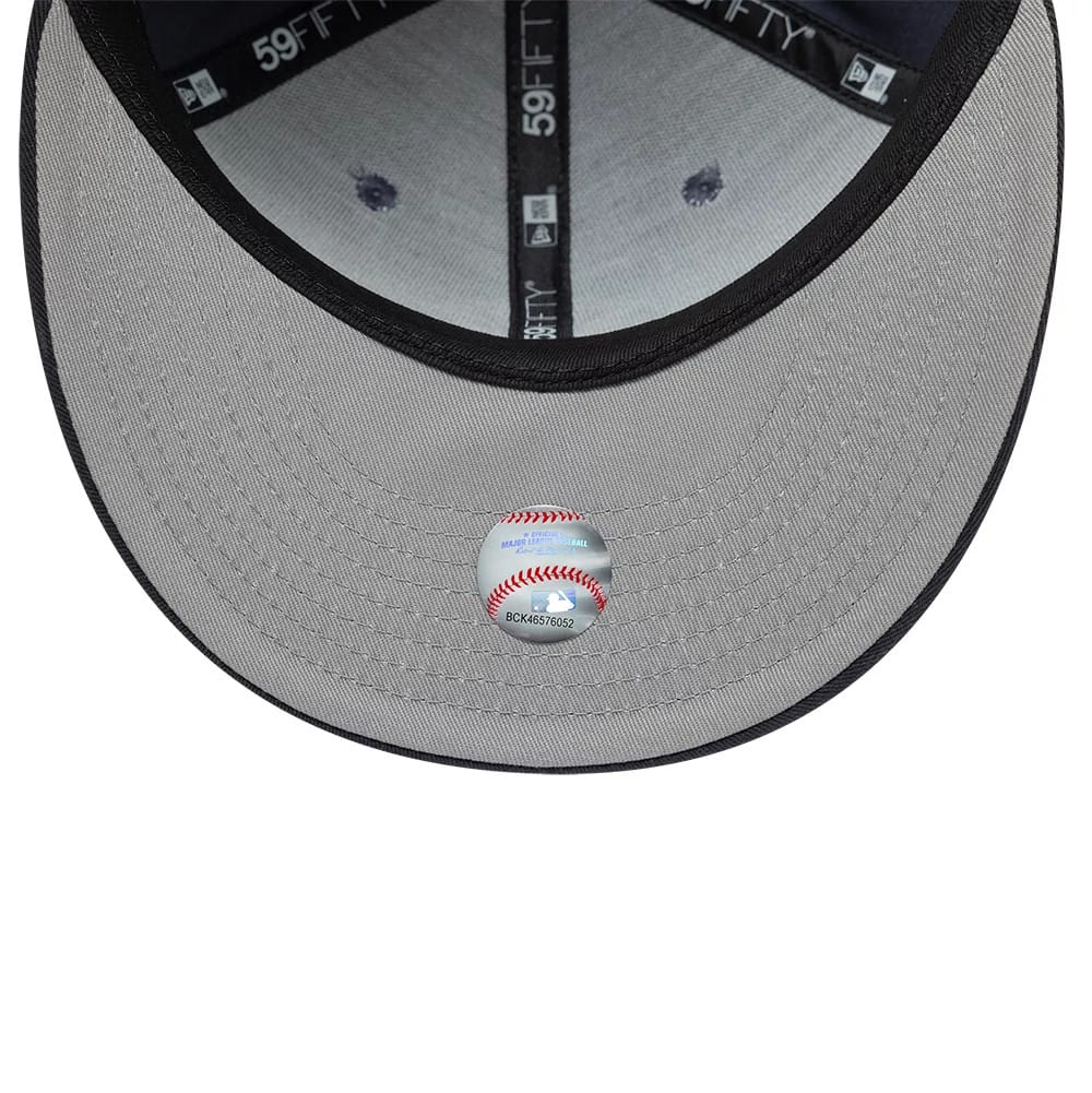 New York Yankees MLB Dark Grey New Era 59FIFTY Fitted Cap, inside view showing the grey undervisor with a baseball design sticker, black 59FIFTY taping along the seams, and the dark sweatband lining the crown interior.