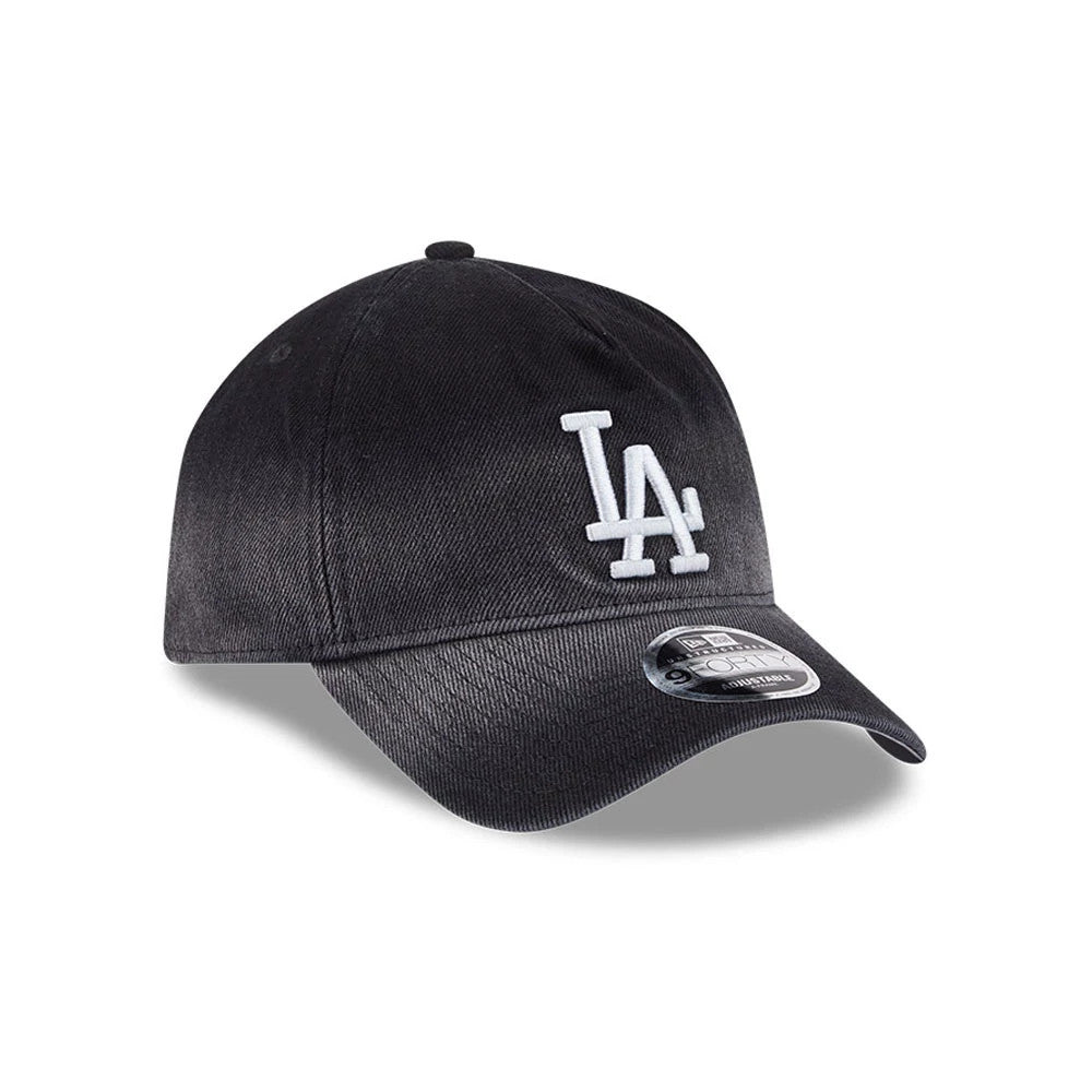 Dodgers MLB Washed Denim Black New Era 9FORTY A-Frame Unstructured Adjustable Cap, three-quarter view showing the white raised LA logo embroidered on the front panel, with a curved visor and 9FORTY size sticker on the black denim fabric.