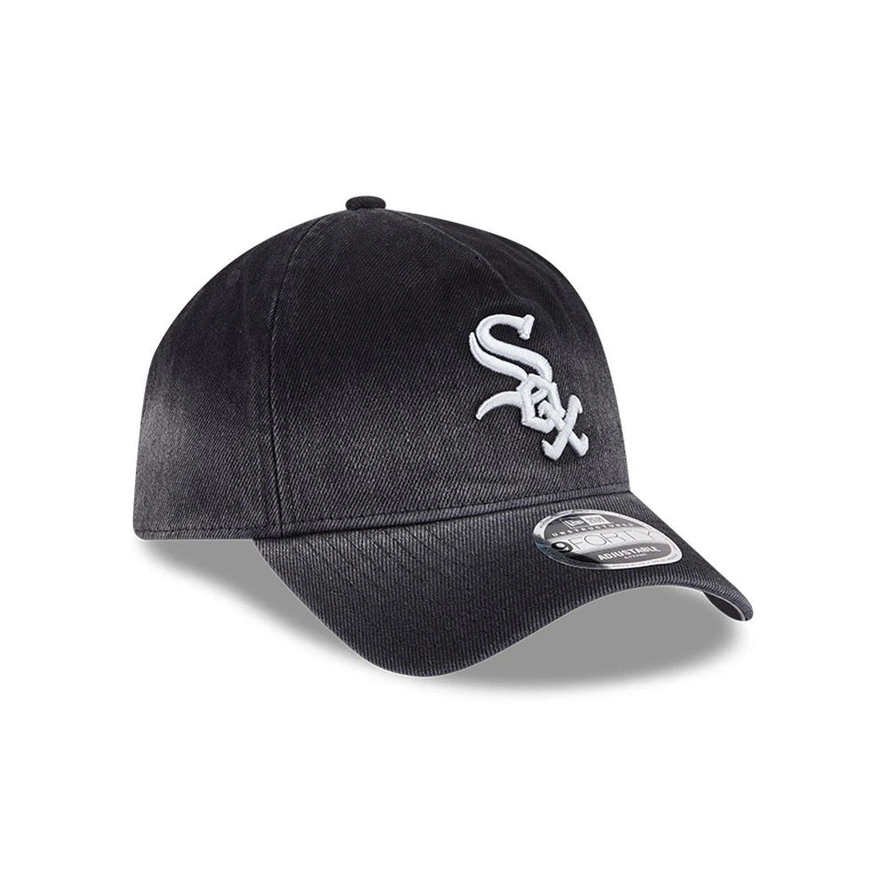 White Sox MLB Washed Denim Black New Era 9FORTY A-Frame Unstructured Adjustable Cap, three-quarter view showing the white embroidered Sox logo on the front panel, curved black visor with a 9FORTY size sticker, and soft unstructured crown.