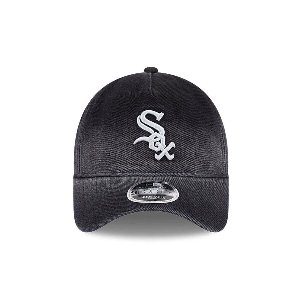 White Sox MLB Washed Denim Black New Era 9FORTY A-Frame Unstructured Adjustable Cap, front view showing the white Sox logo in raised embroidery on the washed black crown and a 9FORTY size sticker on the curved visor.