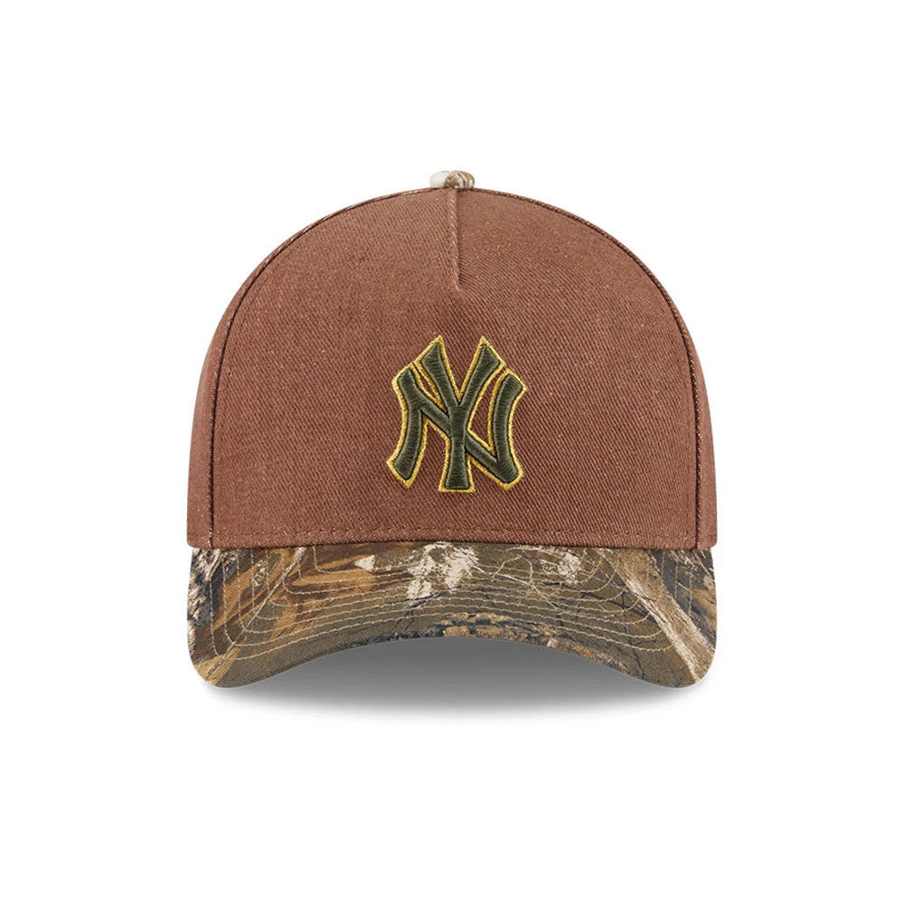 Yankees MLB Cotton Twill Dark Beige New Era 9FORTY M-Crown A-Frame Adjustable Cap, front view showing an olive green embroidered NY logo on the structured dark beige crown, with a distinctive camouflage-patterned curved visor beneath.