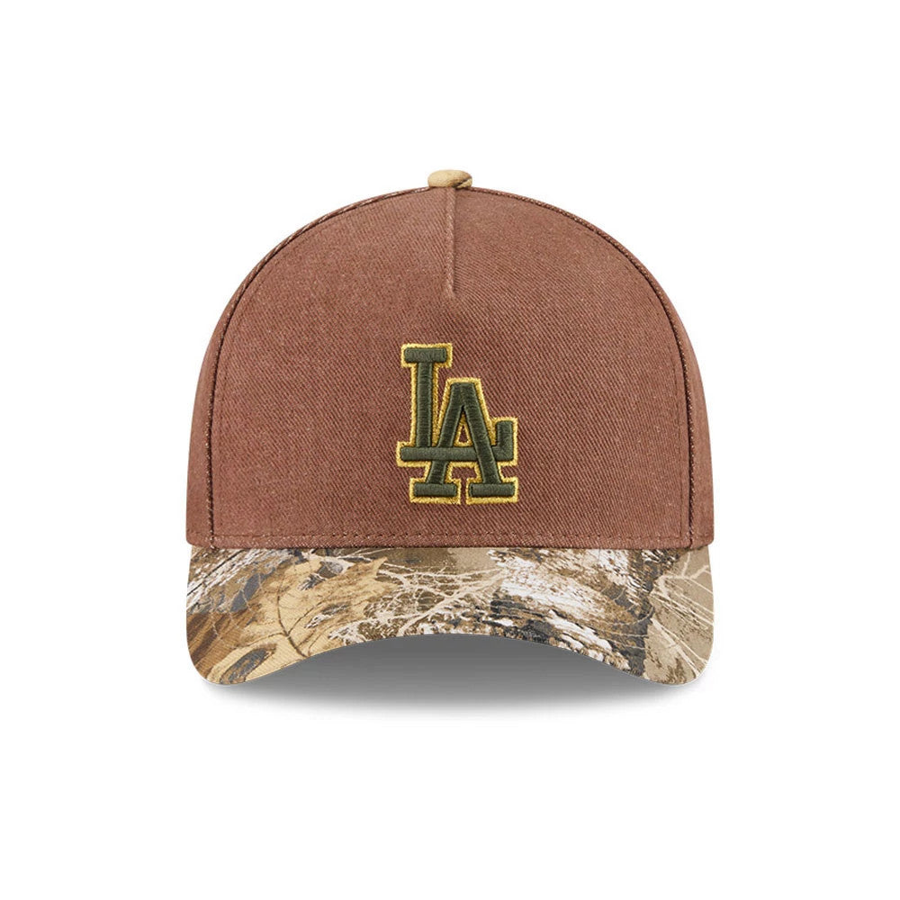 Dodgers MLB Cotton Twill Dark Beige New Era 9FORTY M-Crown A-Frame Adjustable Cap, front view showing the raised yellow embroidered LA logo on the central dark beige panel, complemented by a flat camo-patterned visor and matching top button.