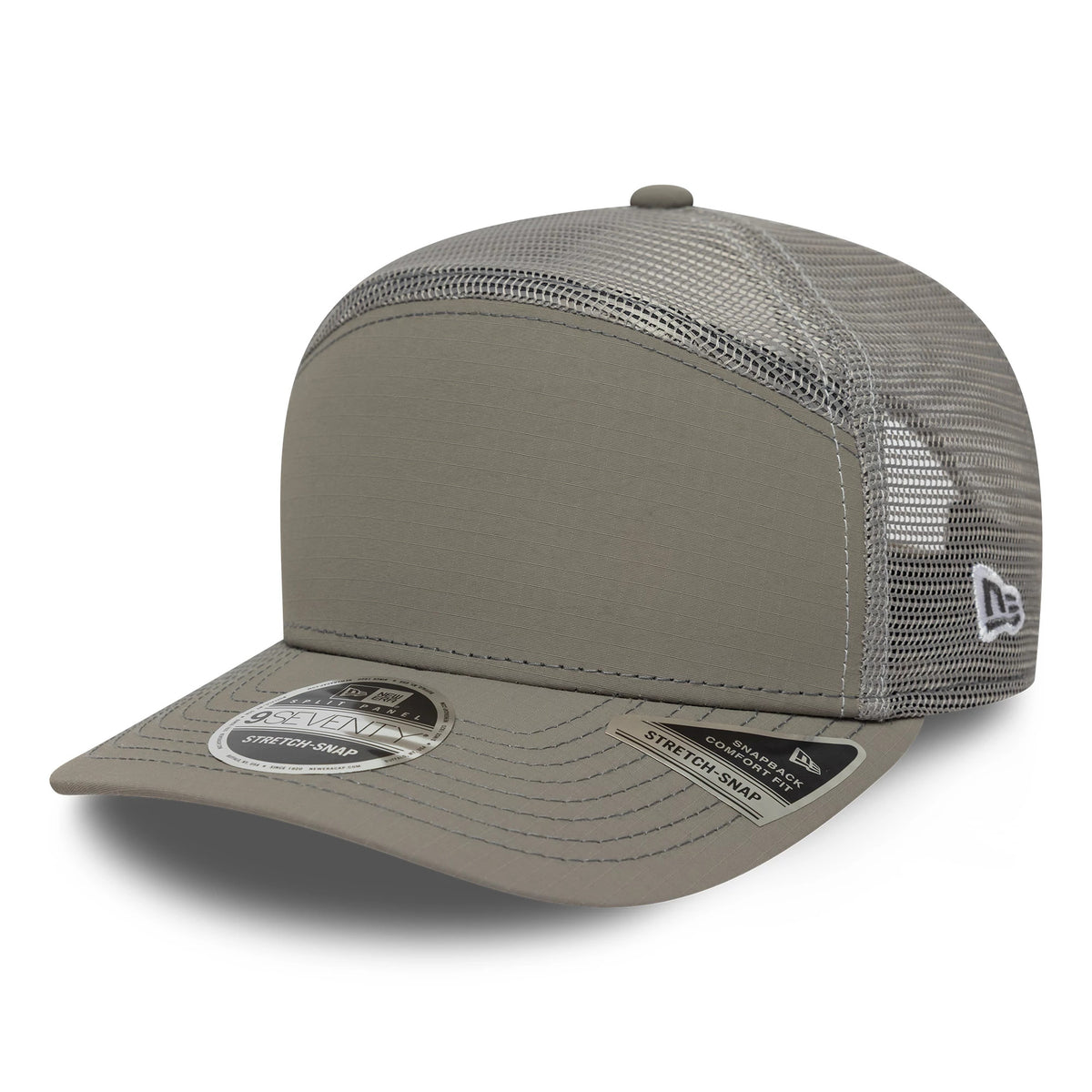 New Era Elevated Basics Open Grey 9SEVENTY Split Panel Stretch Snap Cap, three-quarter view showing a structured grey front panel with a mesh mid and rear section, a curved grey visor with a 9SEVENTY size sticker.
