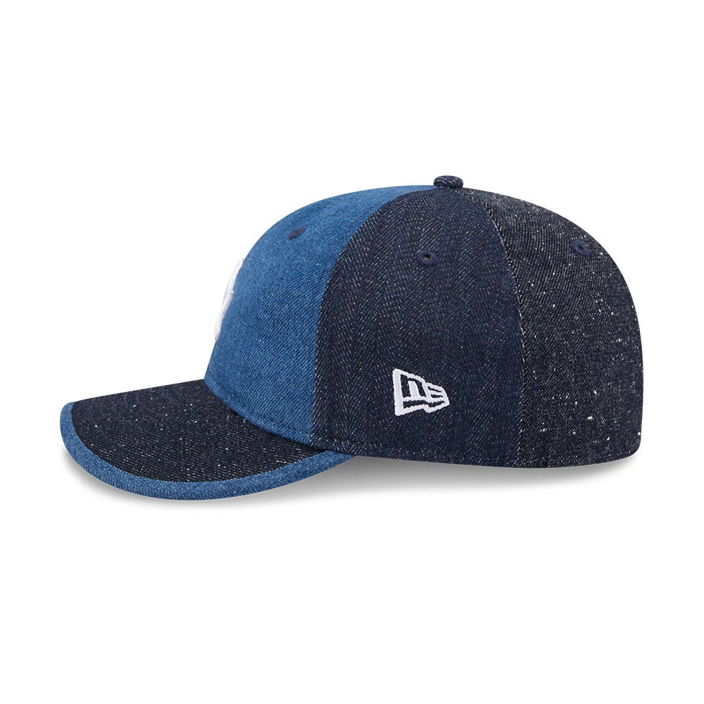 LA Dodgers MLB Multipanel Navy Retro Crown New Era 59FIFTY Fitted Cap, three-quarter view showing the white embroidered New Era flag logo on the left side, blue and navy denim panels, and a matching navy denim flat visor.