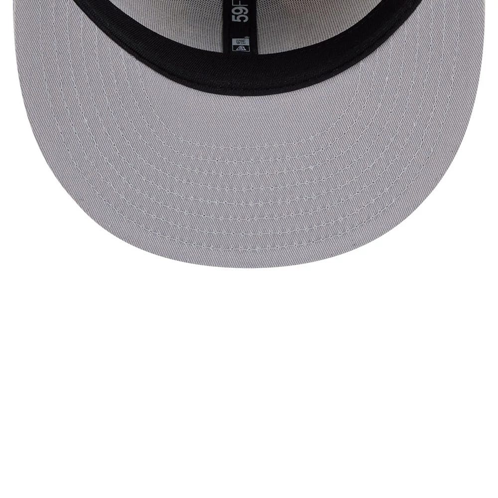 Star Trek Logo Light Beige New Era 59FIFTY Fitted Cap, inside view showing the black interior sweatband, branded taping along the crown seams, and a light beige undervisor extending from the structured visor visor.