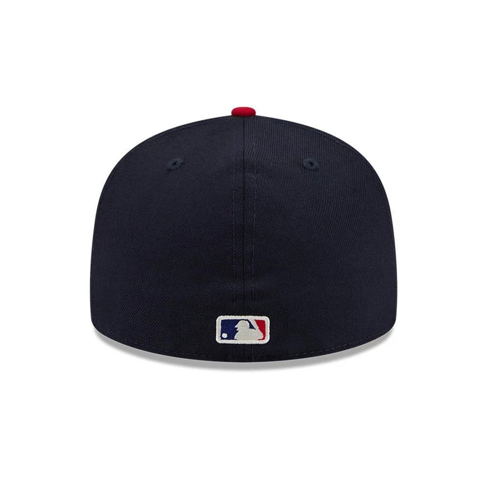MLB Logo Fear Of God X MLB Navy & Red New Era 59FIFTY Fitted Cap, rear view showing the white and red embroidered MLB Batterman logo at the centre back on a structured navy crown with a red top button.