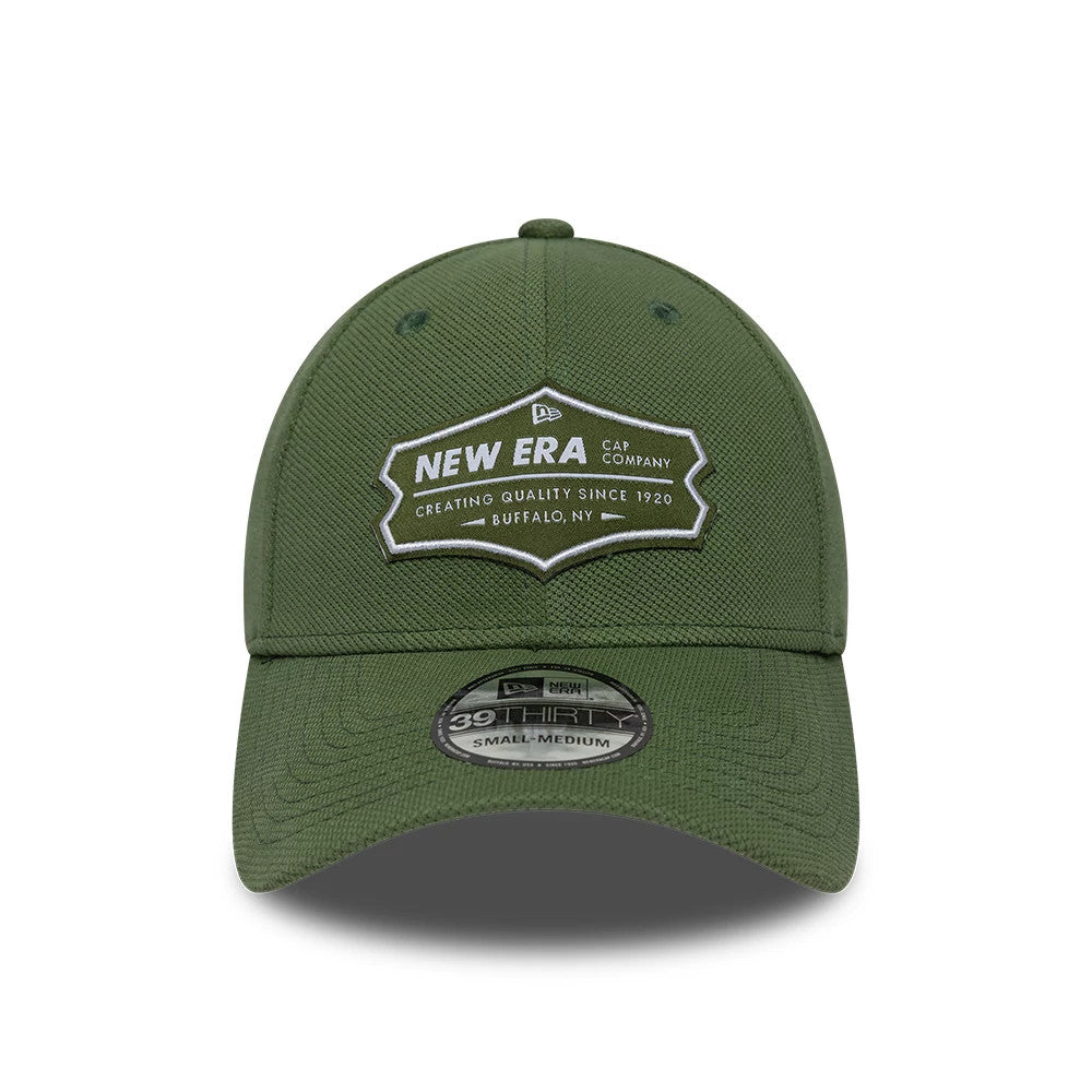 New Era Jersey Green New Era 39THIRTY Stretch Fit Cap, front view showing a white and grey vintage-style embroidered logo on the front panel, with a pre-curved green visor and a 39THIRTY size sticker on the visor.