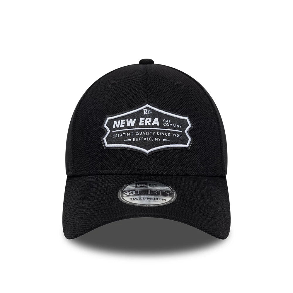 New Era Jersey Black New Era 39THIRTY Stretch Fit Cap, front view showing a white embroidered New Era Cap Company logo patch on the structured black crown, with a curved black visor and a 39THIRTY size sticker on the visor.