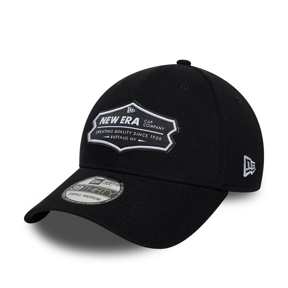 New Era Jersey Black New Era 39THIRTY Stretch Fit Cap, front view showing a white and grey embroidered New Era Cap Company logo on the structured black crown, a black curved visor, and a 39THIRTY size sticker on the visor.