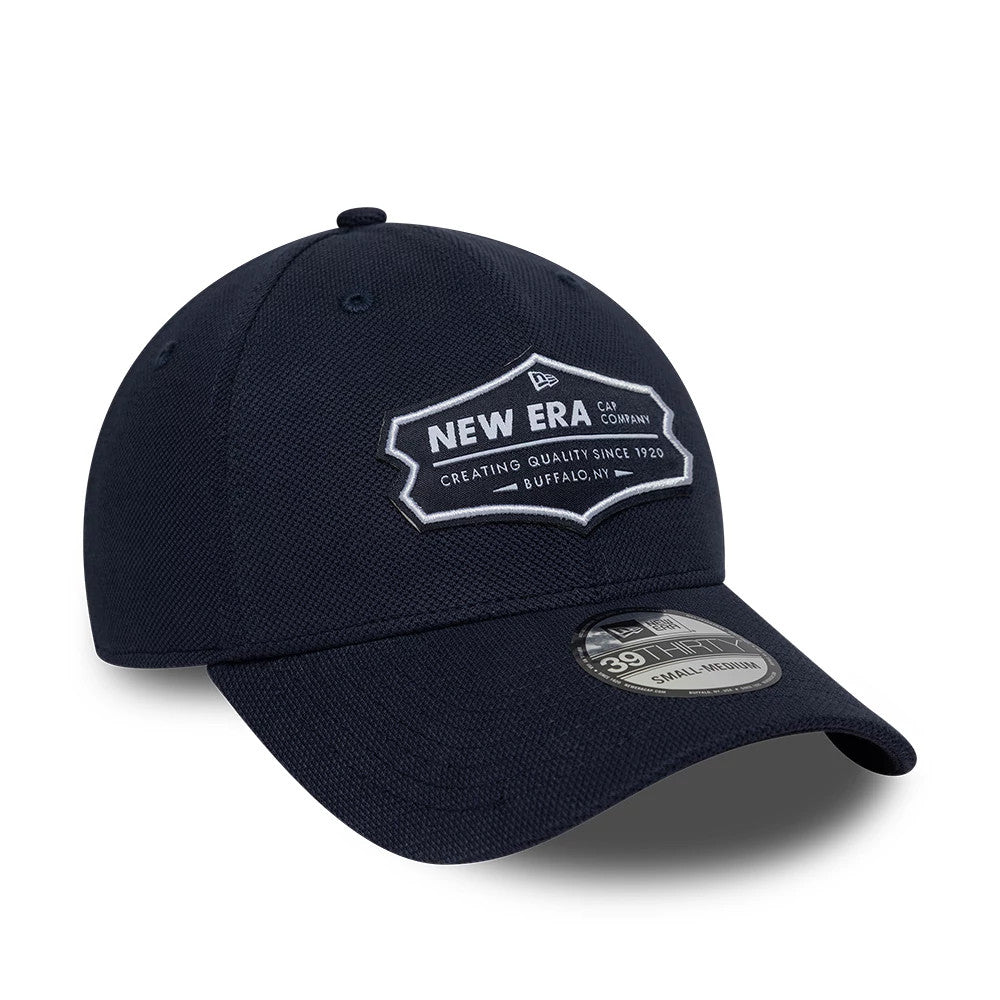 New Era Jersey Navy New Era 39THIRTY Stretch Fit Cap, three-quarter view showing the embroidered New Era Cap Company logo in white on the front panel, structured navy crown, and the 39THIRTY size sticker on the curved navy visor.