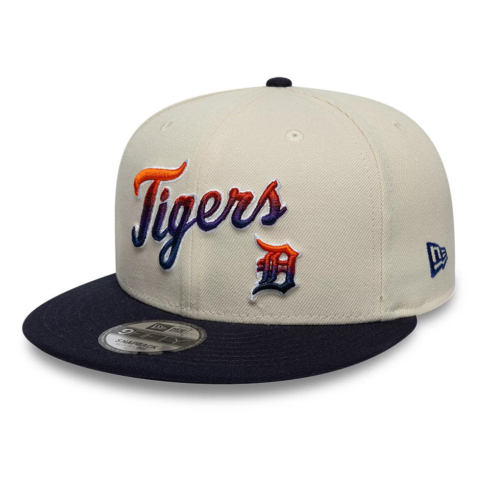 Pictured is this MLB Ombre Script Detroit Tigers 9FIFTY Snapback cap in light beige & navy. 3