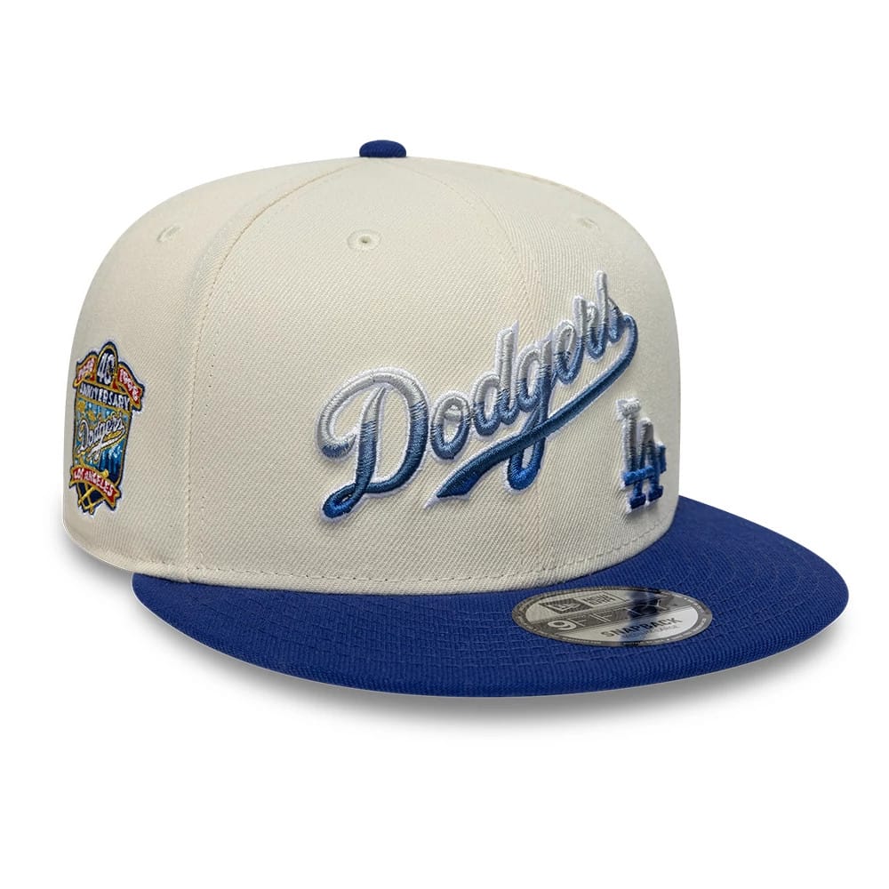 Pictured is this MLB Ombre Script Los Angeles Dodgers 9FIFTY Snapback cap in light beige & blue. 1