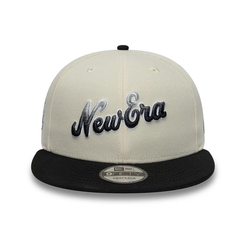 Pictured is this New Era Ombre Script 9FIFTY Snapback cap in light beige & black. 2
