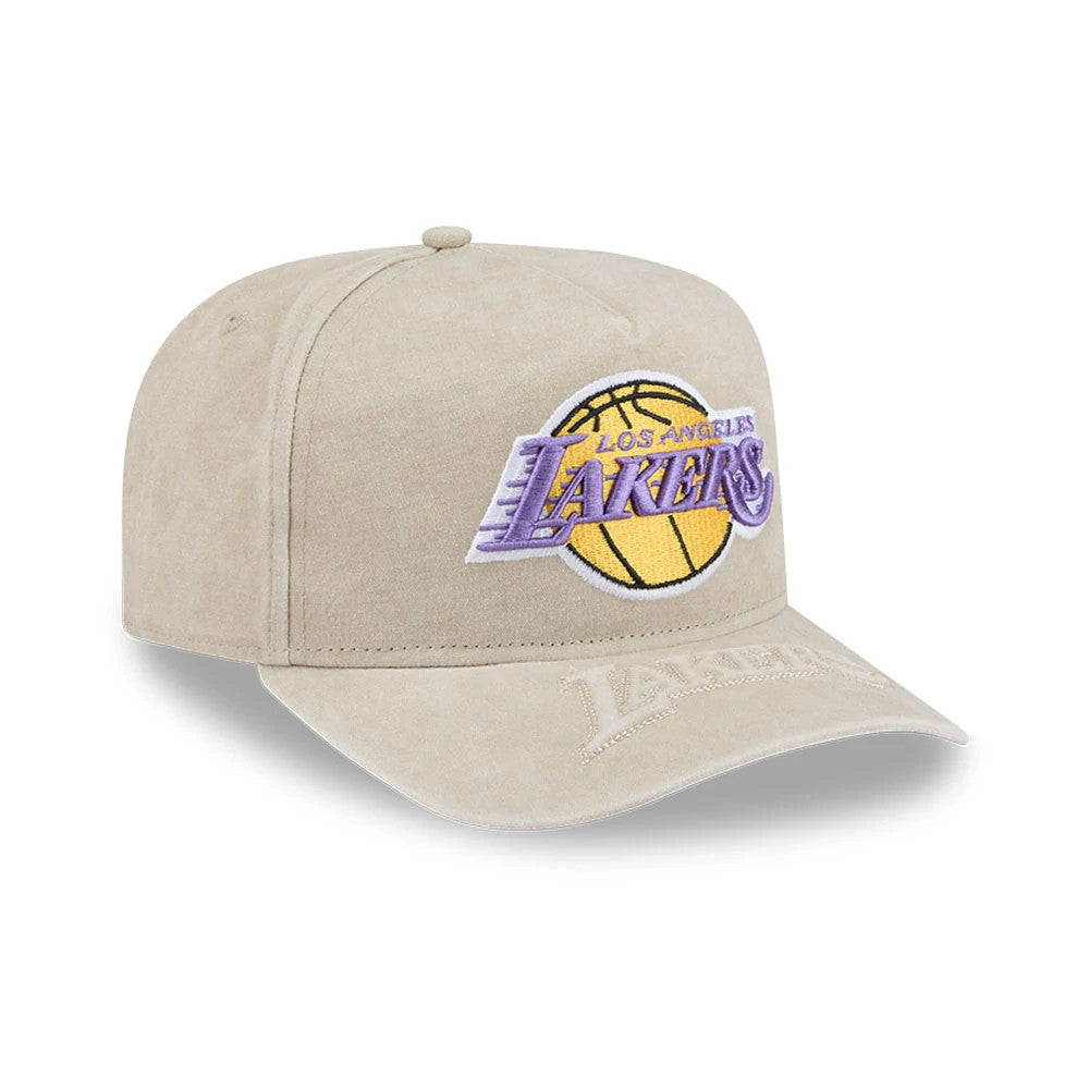 LA Lakers NBA Light Beige New Era 9FIFTY A-Frame Snapback Adjustable Cap, three-quarter view showing the purple and gold Lakers logo embroidered on the front panel, with a matching light beige visor and an embroidered team name on the edge.